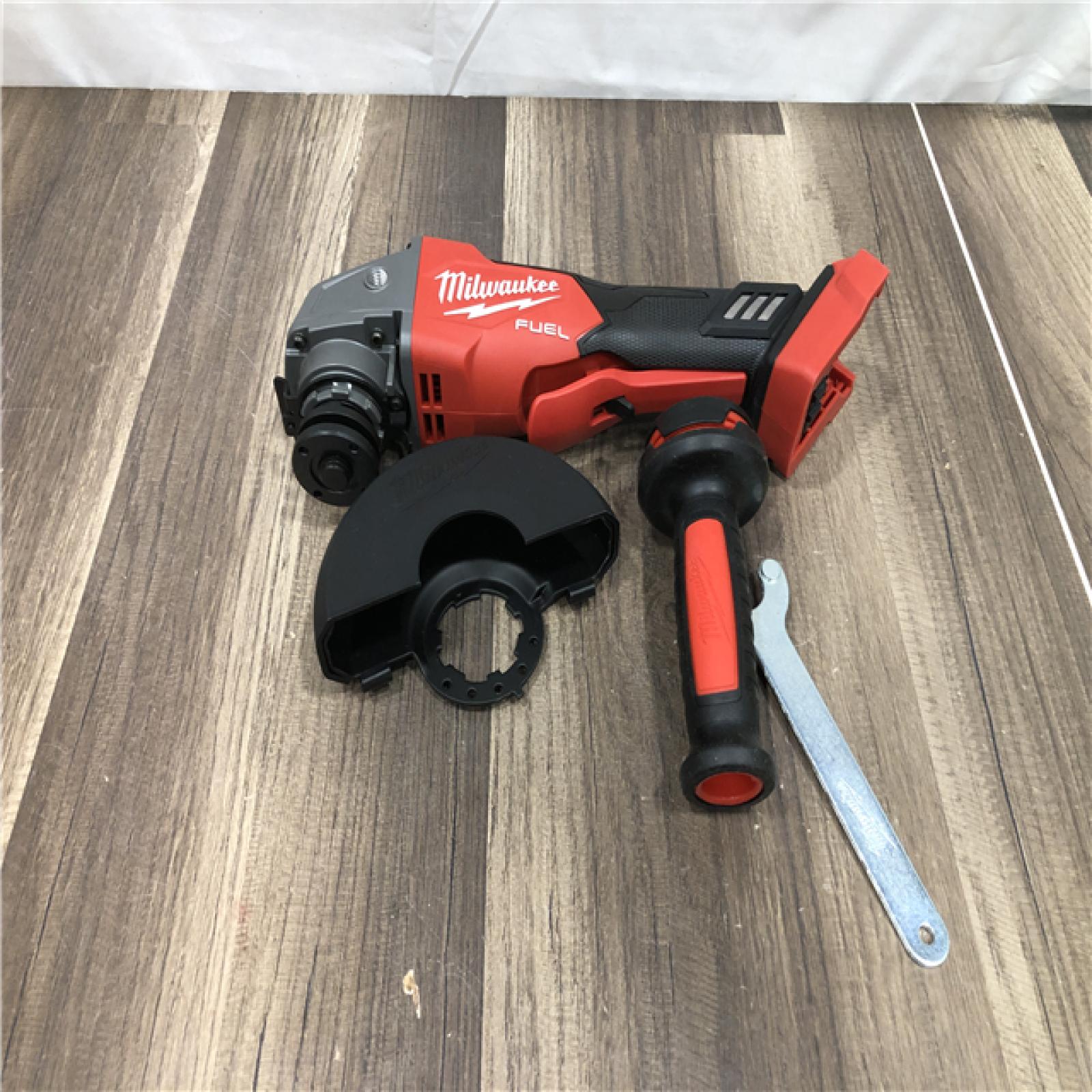 AS-IS Milwaukee FUEL 18V Lithium-Ion Brushless Cordless 4-1/2 in./5 in. Grinder w/Paddle Switch (Tool-Only)