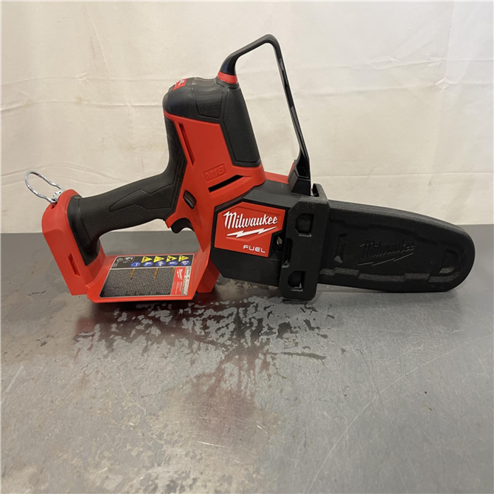 AS-IS - Milwaukee M18 FUEL 18V Lithium-Ion Brushless Battery 8 in. HATCHET Pruning Saw