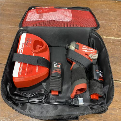 AS-IS M12 FUEL SURGE 12V Lithium-Ion Brushless Cordless 1/4 in. Hex Impact Driver Compact Kit W/Two 2.0Ah Batteries, Bag