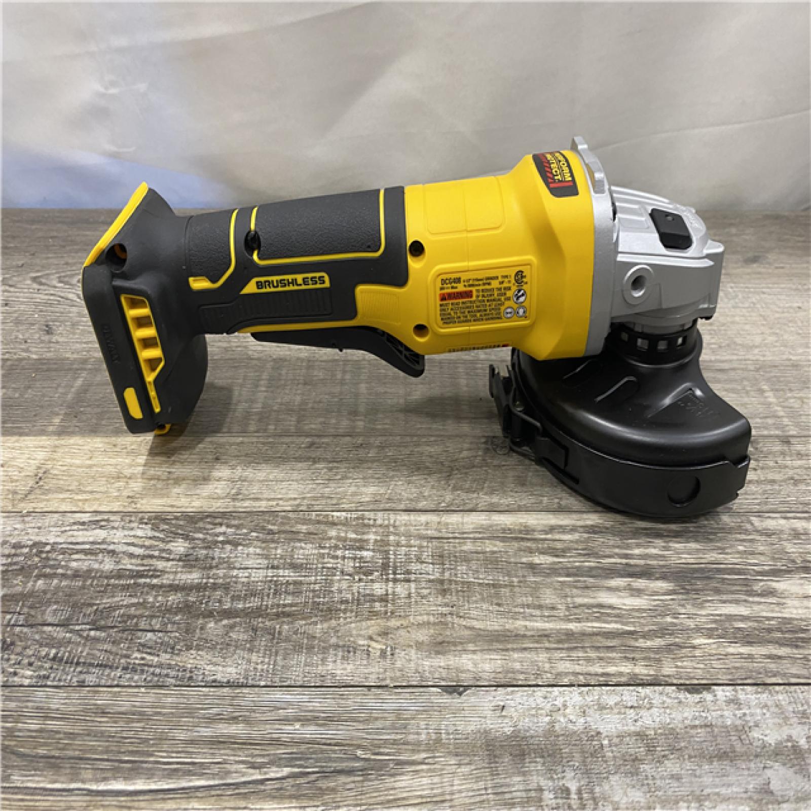 AS-IS DEWALT 20V MAX Cordless Brushless 4-1/2 in. Angle Grinder with Paddle Switch (Tool Only)