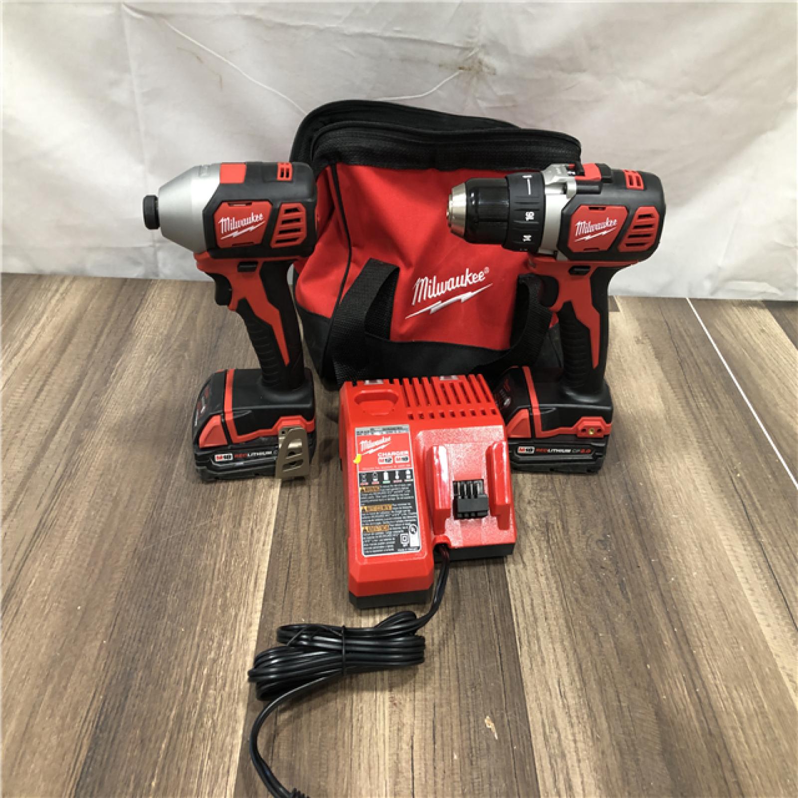AS-IS Milwaukee M18 18V Lithium-Ion Cordless Drill Driver/Impact Driver Combo Kit