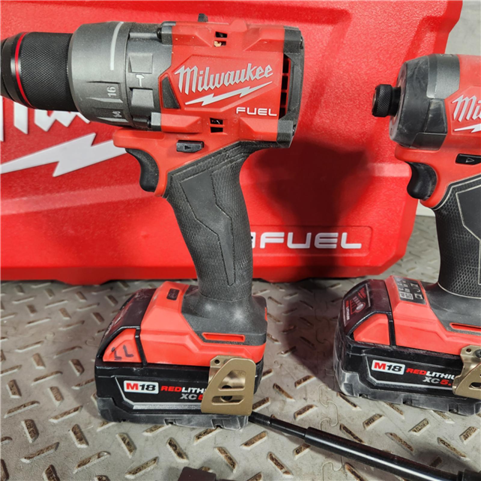 Houston location- AS-IS Milwaukee M18 Compact Brushless 2-Tool Combo Kit