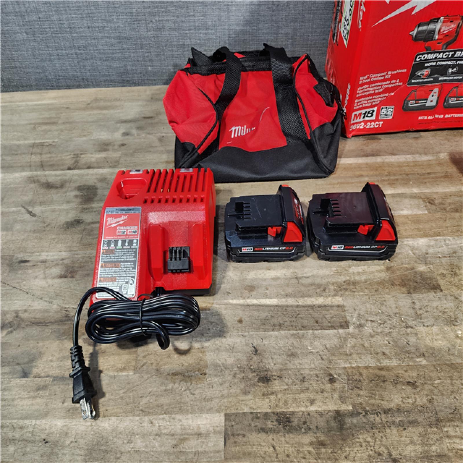 HOUSTON LOCATION - AS-IS Milwaukee M18 18V Lithium-Ion Brushless Cordless Compact Drill/Impact Combo Kit (2-Tool) W/(2) 2.0 Ah Batteries  Charger & Bag