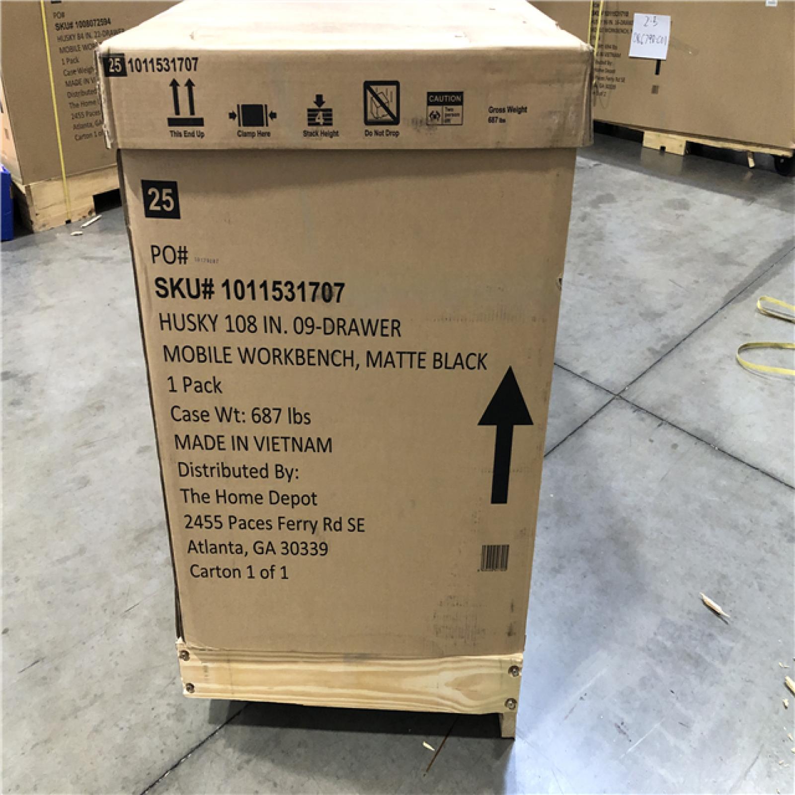 DALLAS LOCATION- AS-IS Husky 108 in. W x 24 in. D 9-Drawer Heavy-Duty Mobile Workbench with Stainless Steel Top in Matte Black