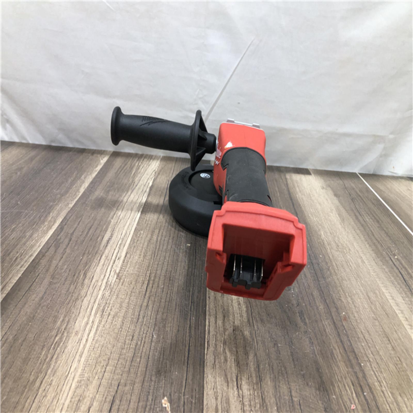 AS-IS Milwaukee 18V Lithium-Ion Brushless Cordless 4-1/2 in./5 in. Grinder w/Paddle Switch (Tool-Only)