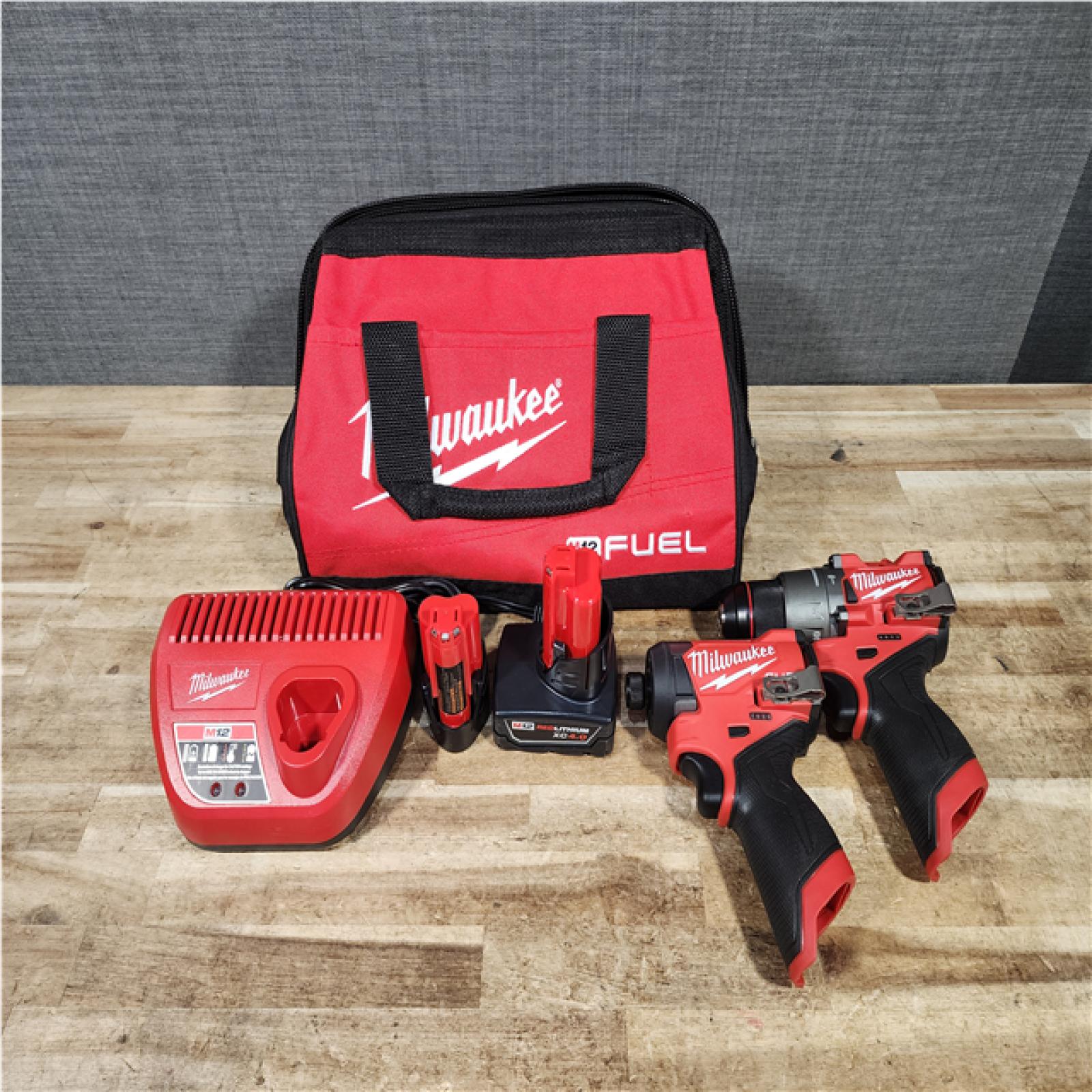 HOUSTON LOCATION - AS - IS Milwaukee FUEL 12-Volt Lithium-Ion Brushless Cordless Hammer Drill and Impact Driver Combo Kit