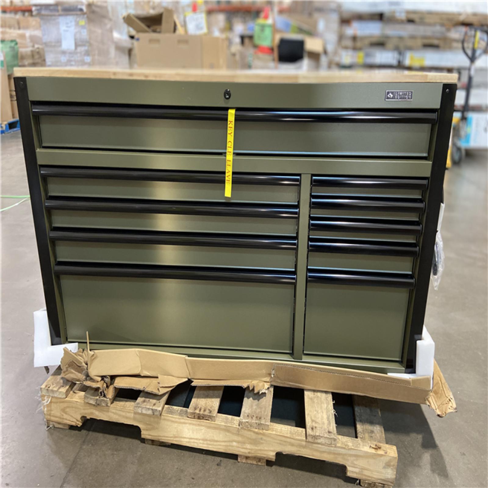 DALLAS LOCATION - Husky Limited Edition 52 in. x 24.5 in. D 10-Drawer Army Green Mobile Workbench with Solid Wood Top