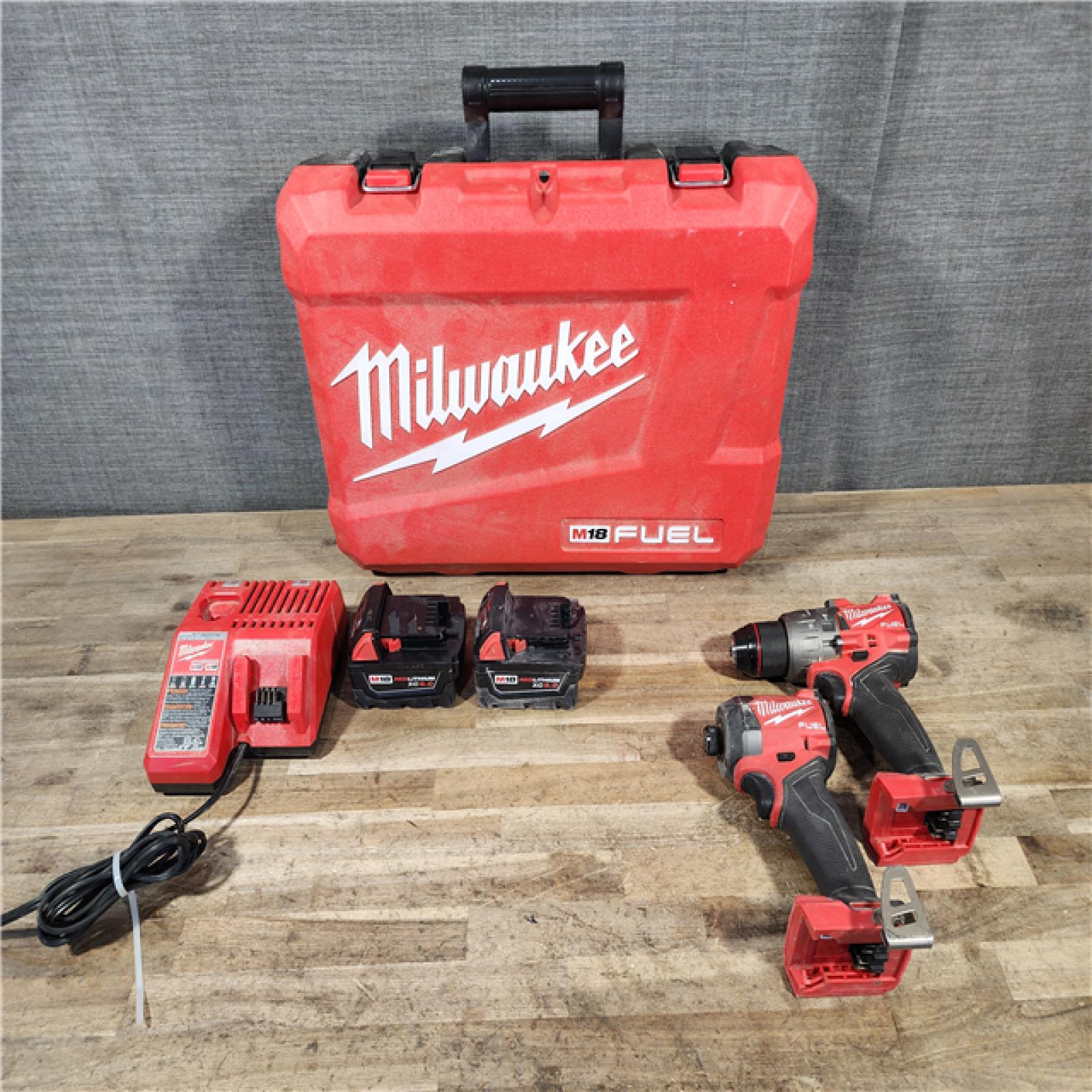 HOUSTON LOCATION - AS-IS Milwaukee FUEL 18V Lithium-Ion Brushless Cordless Hammer Drill and Impact Driver Combo Kit