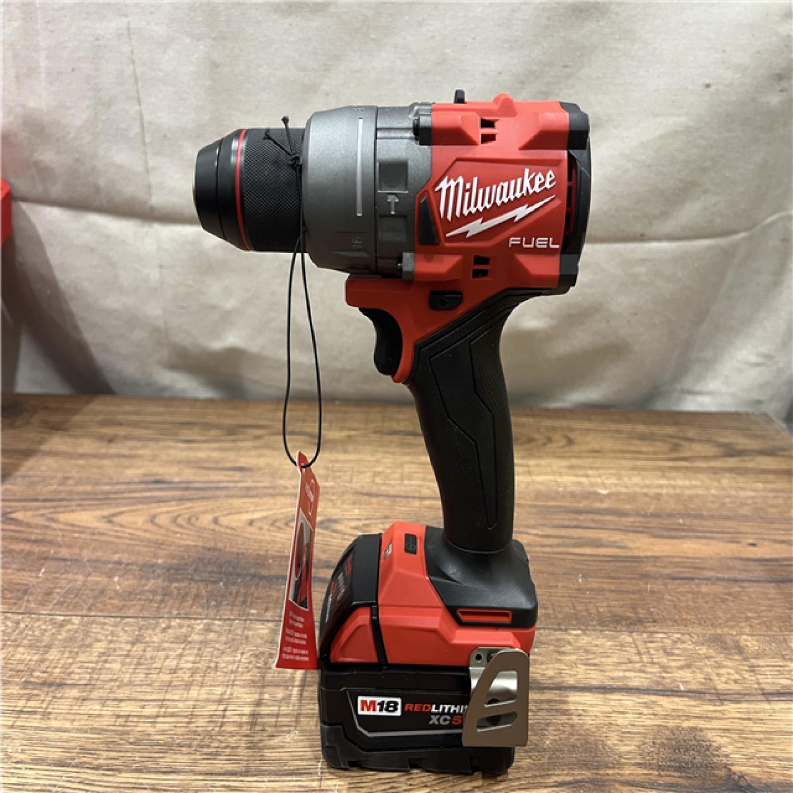 AS-IS Milwaukee 2904-22 Hammer Drill Driver Kit with Batteries  Charger & Tool Case  Red