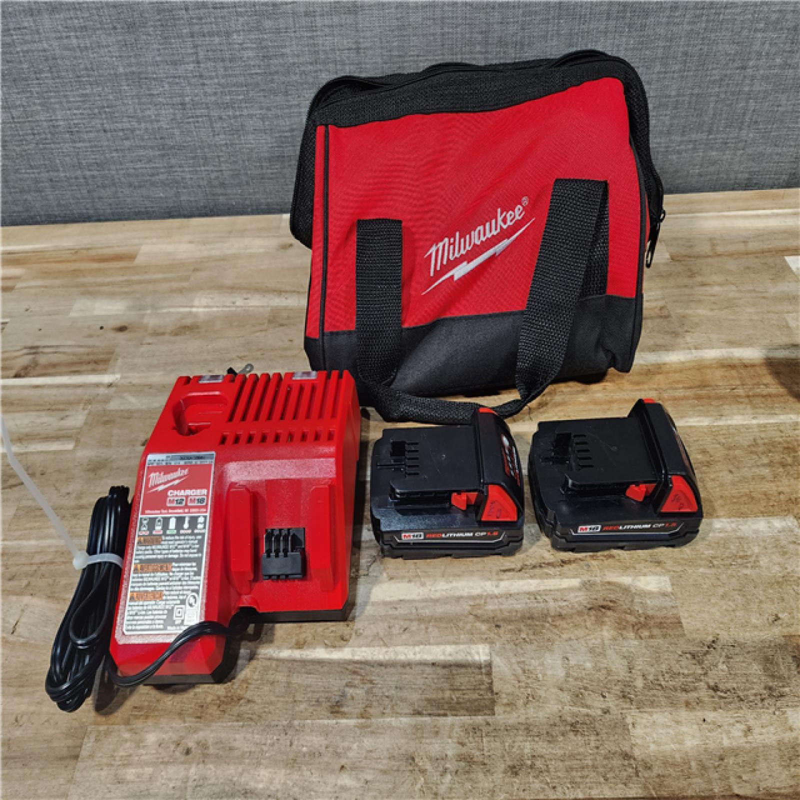 HOUSTON LOCATION - AS-IS Milwaukee 18V Lithium-Ion Cordless Drill Driver/Impact Driver Combo Kit