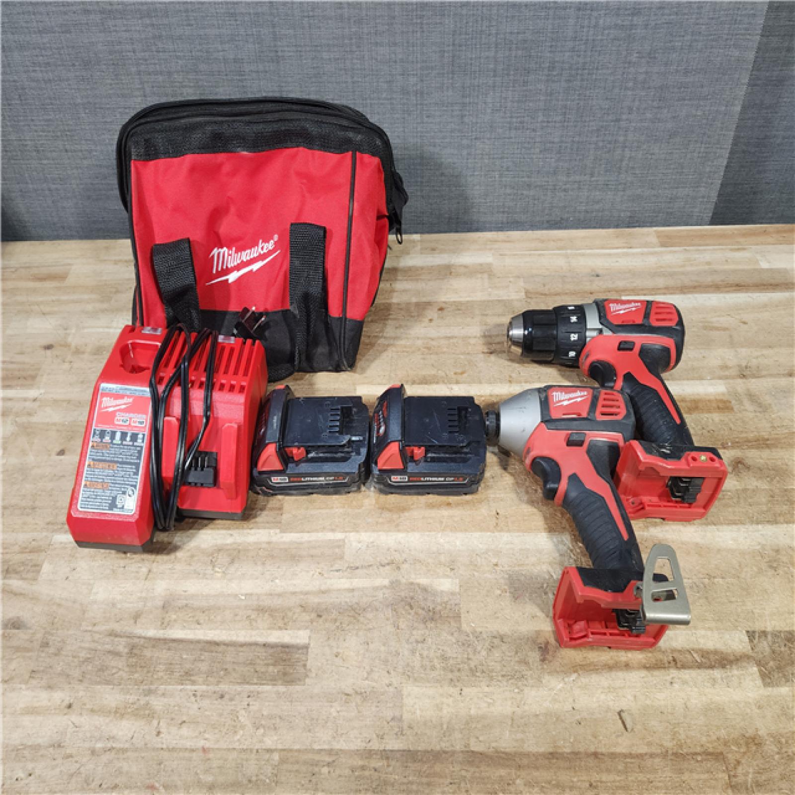 HOUSTON LOCATION - AS - IS Milwaukee 18V Lithium-Ion Cordless Drill Driver/Impact Driver Combo Kit
