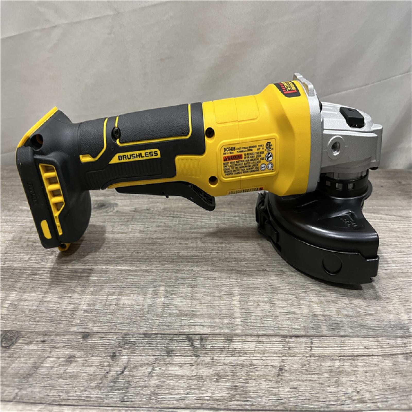 AS-IS DEWALT 20V MAX Cordless Brushless 4-1/2 in. Angle Grinder with Paddle Switch (Tool Only)