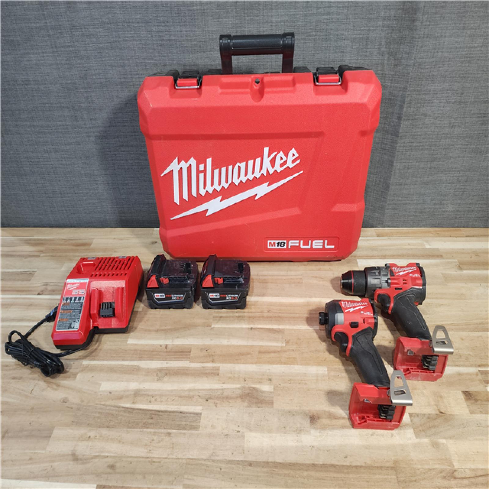 HOUSTON LOCATION - AS-IS Milwaukee  FUEL 18V Lithium-Ion Brushless Cordless Hammer Drill and Impact Driver Combo Kit