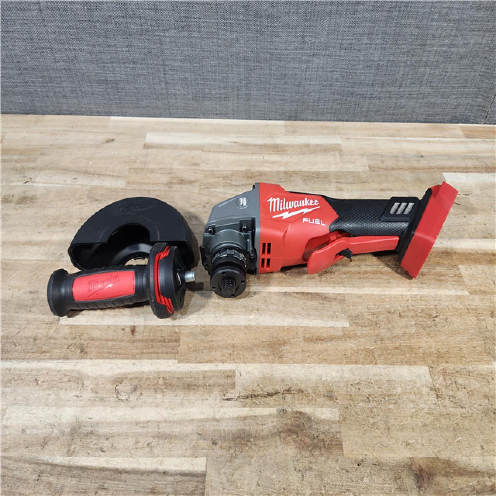 HOUSTON LOCATION - AS - IS Milwaukee FUEL 18V Lithium-Ion Brushless Cordless 4-1/2 in./5 in. Grinder w/Paddle Switch (Tool-Only)