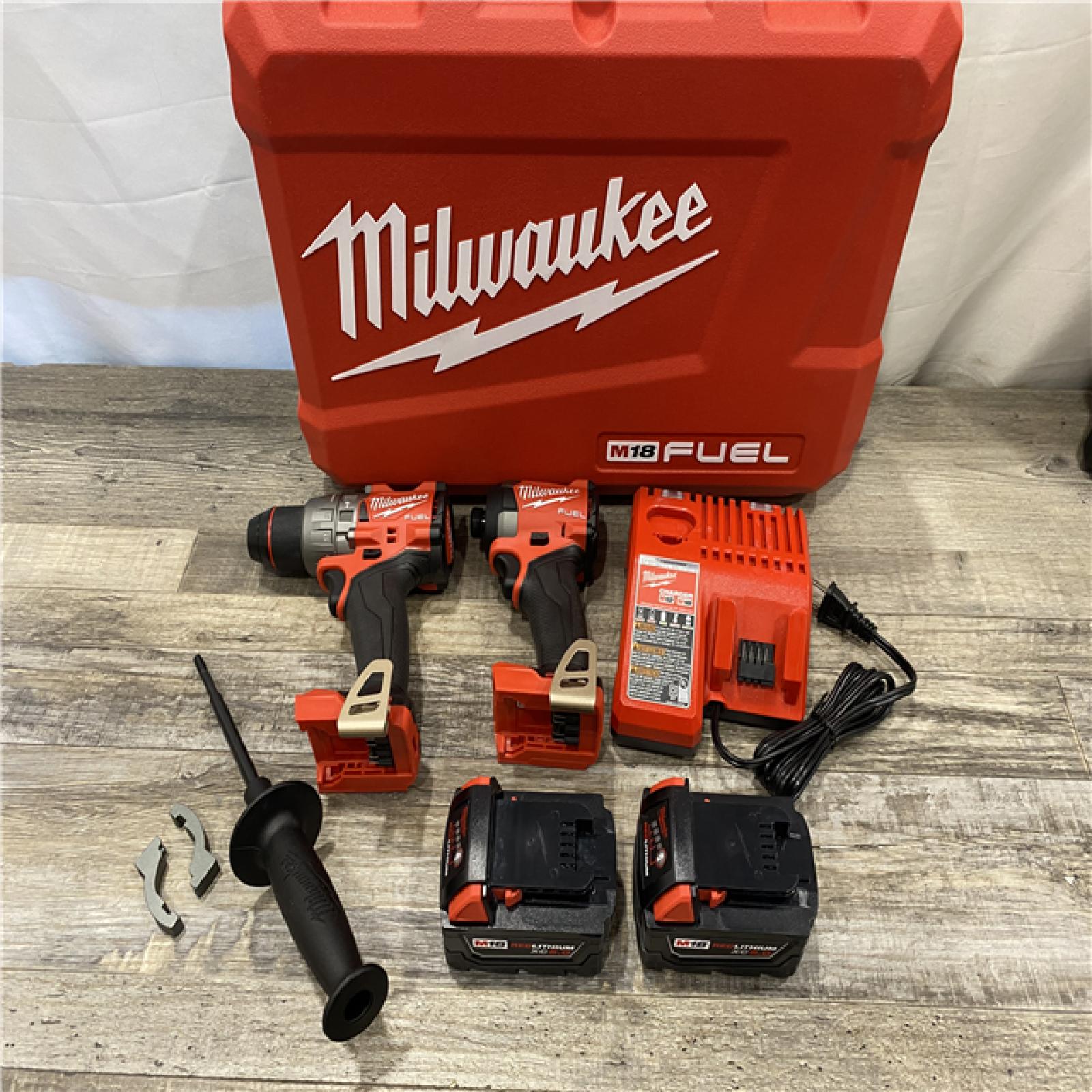 LIKE NEW - Milwaukee FUEL 18V Lithium-Ion Brushless Cordless Hammer Drill and Impact Driver Combo Kit