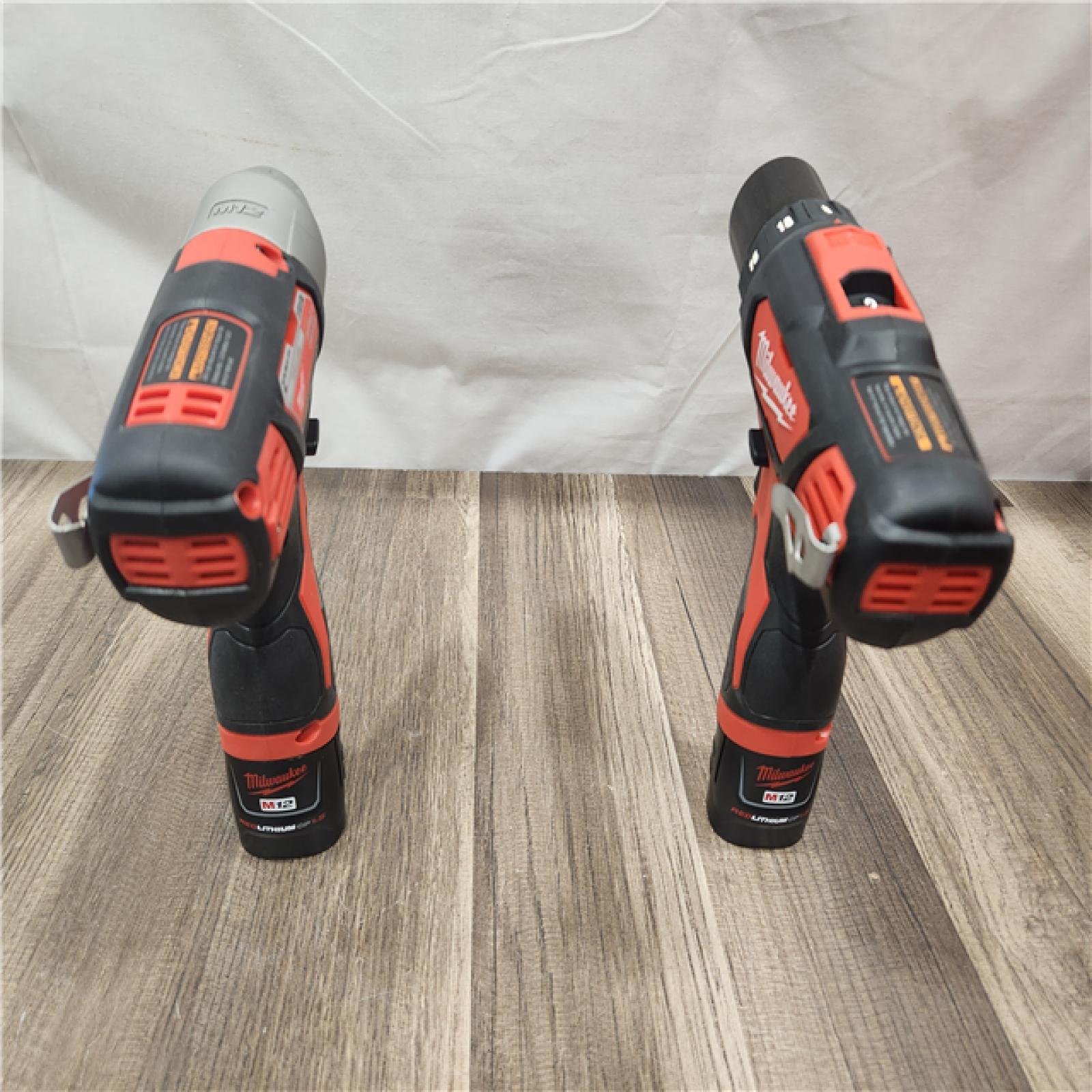 AS-IS- Milwaukee M12 Cordless Combination 3/8  Drill / Driver and 1/4  Hex Impact Driver Dual Power Tool Kit (2 Lithium Ion Batteries  Charger   and B