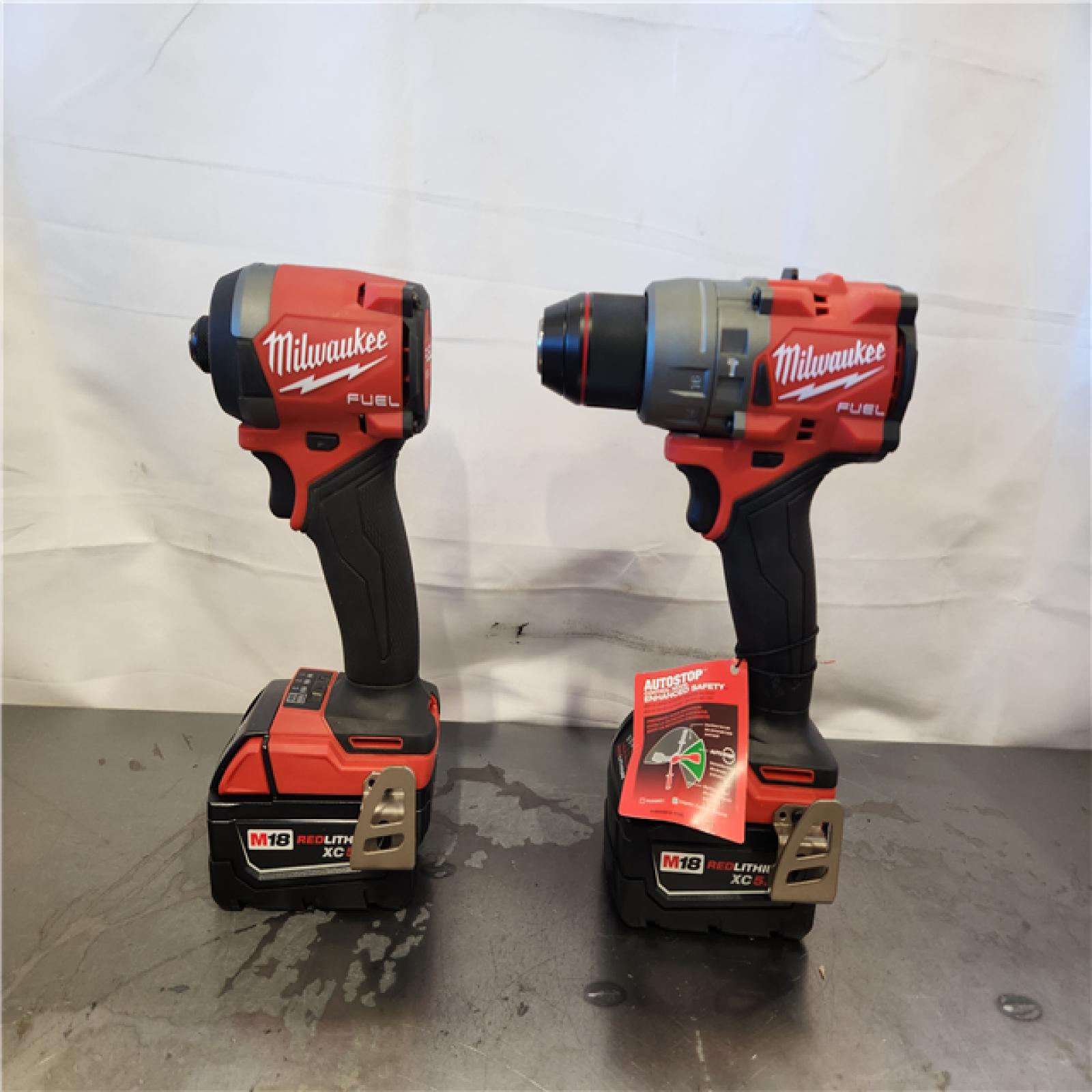 AS-IS- Milwaukee FUEL 18V Lithium-Ion Brushless Cordless Hammer Drill and Impact Driver Combo Kit
