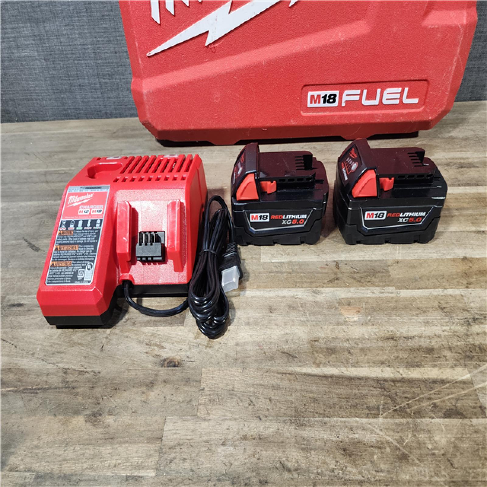 HOUSTON LOCATION - AS-IS Milwaukee FUEL 18V Lithium-Ion Brushless Cordless Hammer Drill and Impact Driver Combo Kit