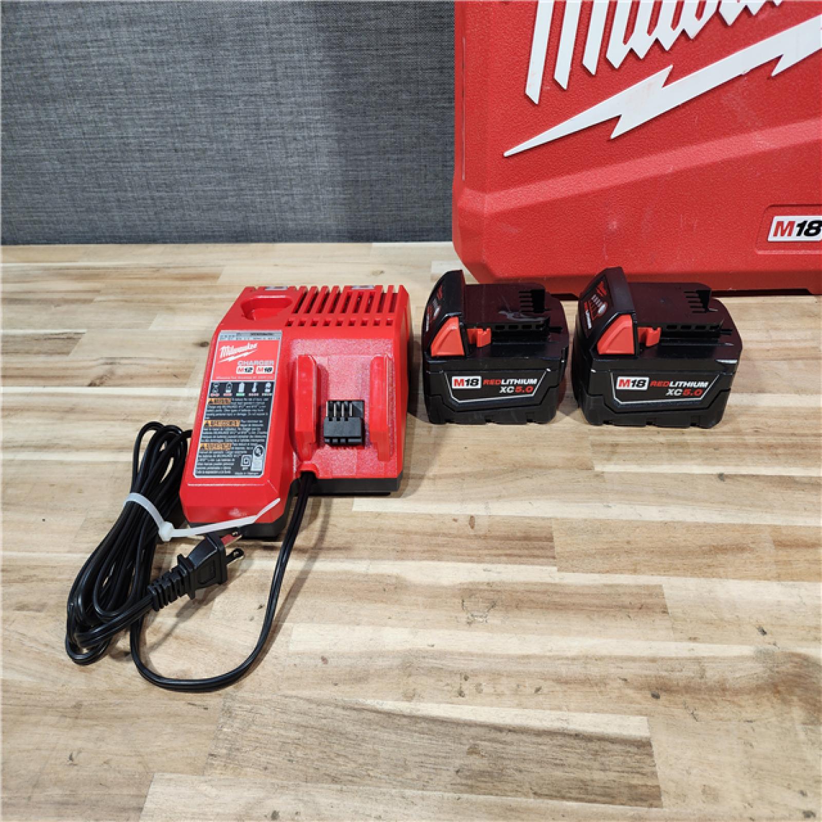 HOUSTON LOCATION - AS-IS Milwaukee  FUEL 18V Lithium-Ion Brushless Cordless Hammer Drill and Impact Driver Combo Kit