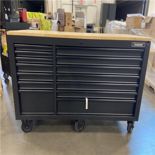 DALLAS LOCATION - Husky 61 in. W x 23 in. D Heavy Duty 15-Drawer Mobile Workbench Tool Chest with Solid Wood Top in Matte Black