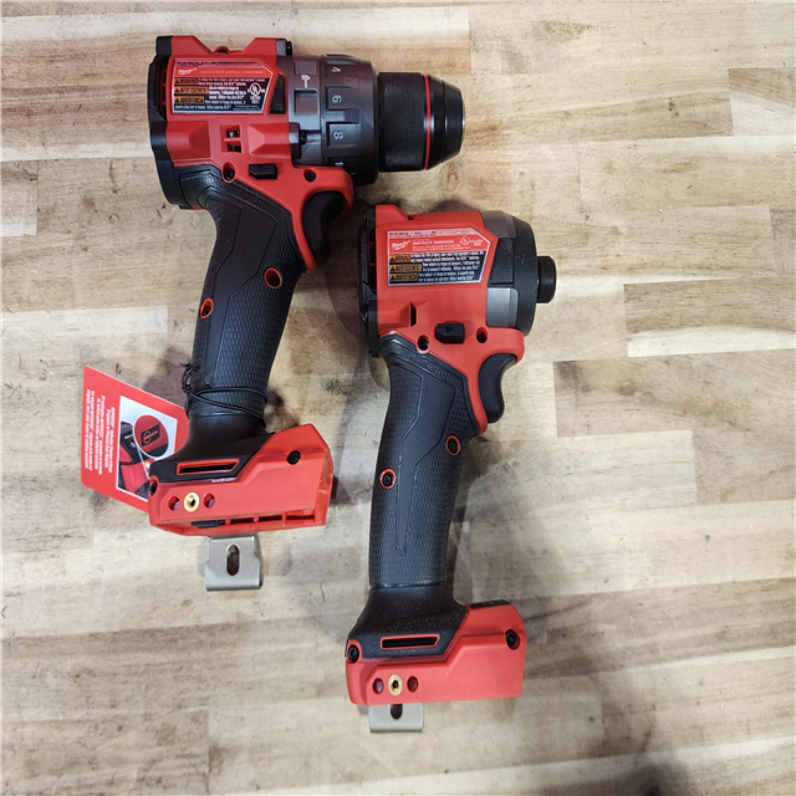 HOUSTON LOCATION - AS-IS (APPEARS LIKE NEW) Milwaukee  FUEL 18V Lithium-Ion Brushless Cordless Hammer Drill and Impact Driver Combo Kit