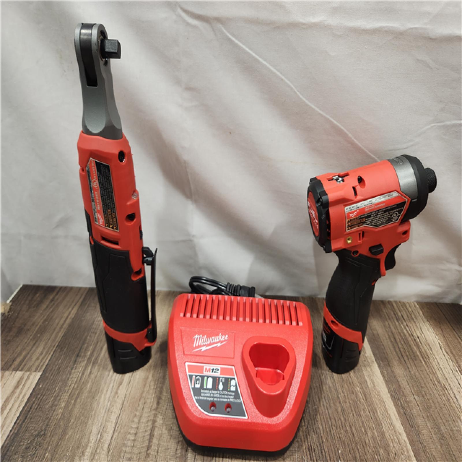 AS-IS- Milwaukee M12 FUEL 12V Lithium-Ion Cordless 3/8 in. Ratchet and 1/4 in. Impact Driver Kit