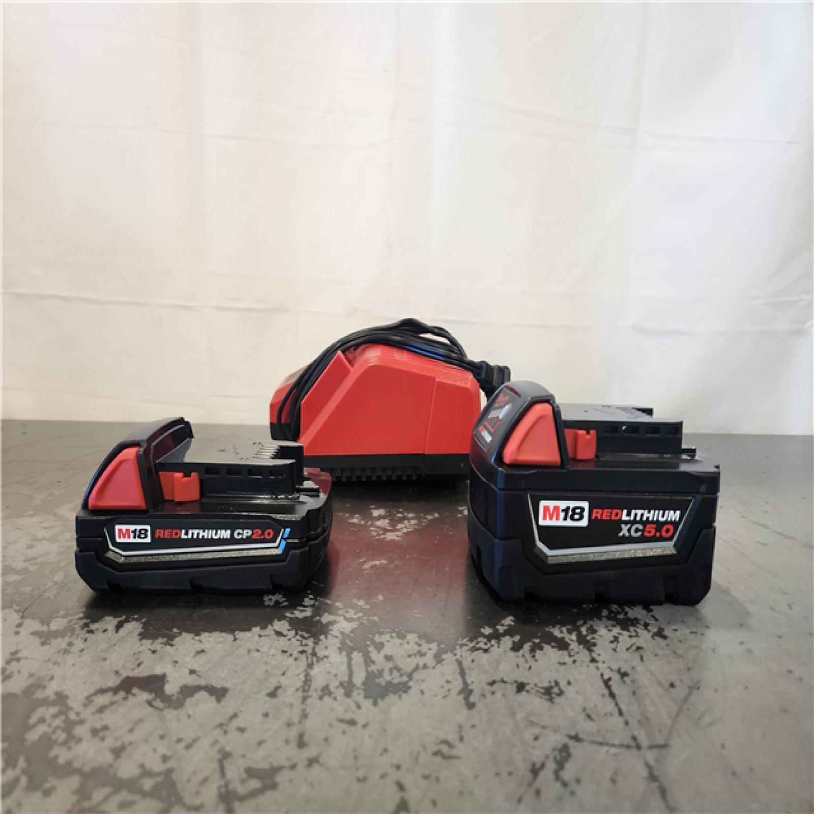 AS-IS- Milwaukee M18 Redlithium Xc5.0 Resistant Battery Starter Kit