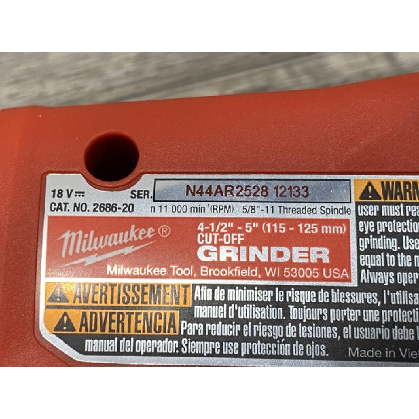 AS-IS Milwaukee 18V Lithium-Ion Brushless Cordless 4-1/2 in./5 in. Grinder w/Paddle Switch (Tool-Only)