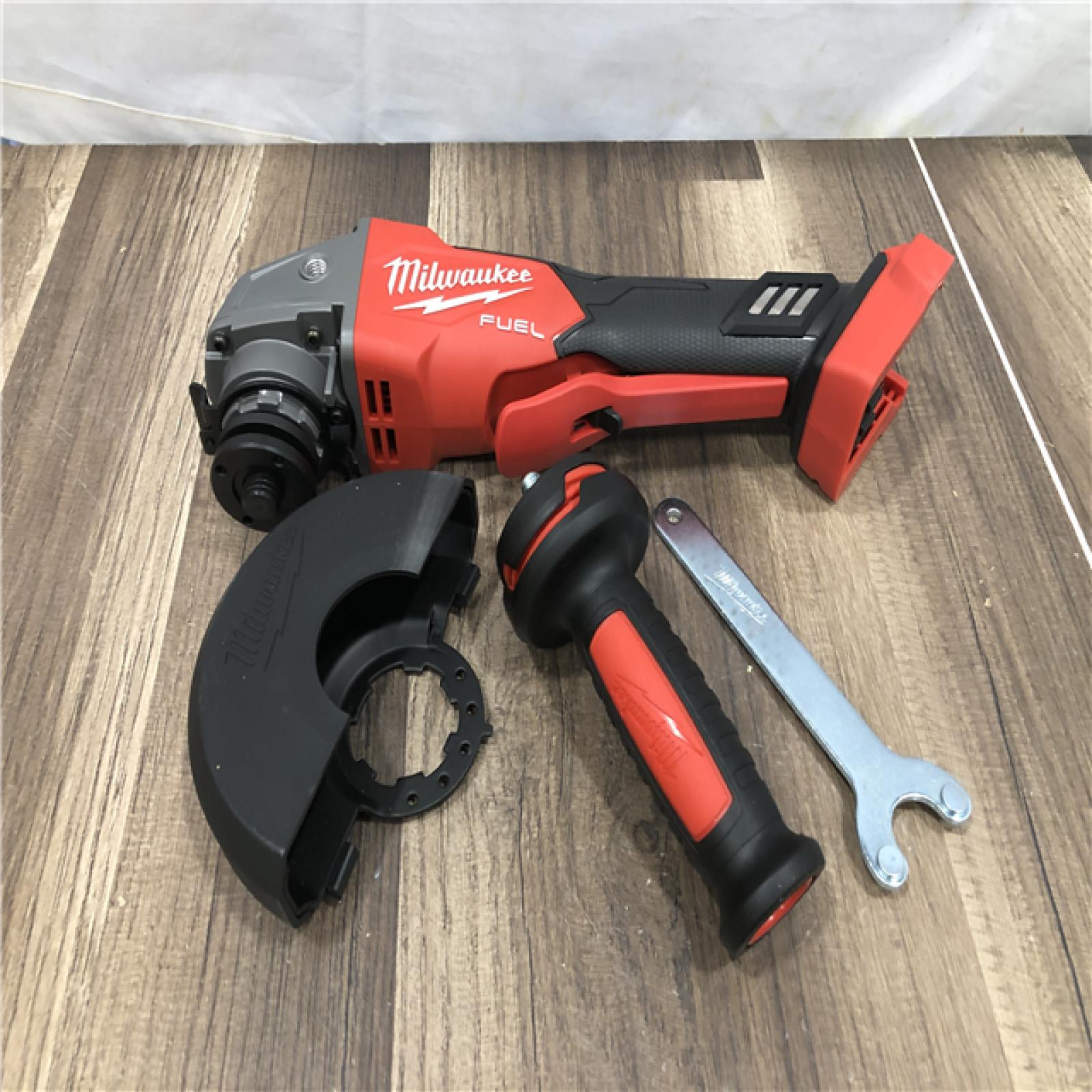 AS-IS Milwaukee FUEL 18V Lithium-Ion Brushless Cordless 4-1/2 in./5 in. Grinder with Variable Speed & Paddle Switch (Tool-Only)