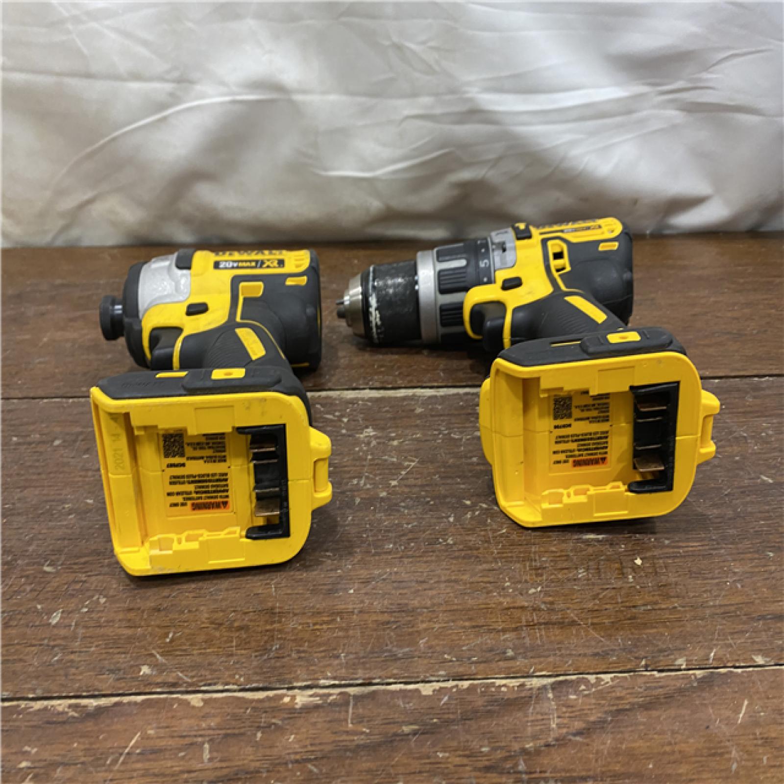 AS-IS DEWALT 20V MAX XR Hammer Drill and ATOMIC Impact Driver 2 Tool Cordless Combo Kit with (2) 4.0Ah Batteries, Charger, and Bag