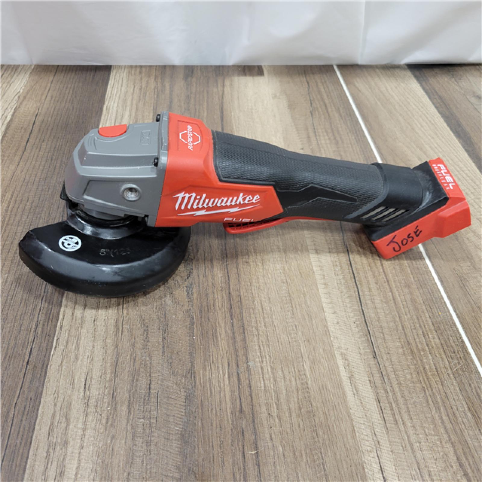 AS-IS Milwaukee 2880-20 M18 FUEL 18-Volt Lithium-Ion Brushless Cordless 4-1/2 in./5 in. Grinder W/Paddle Switch (Tool-Only)