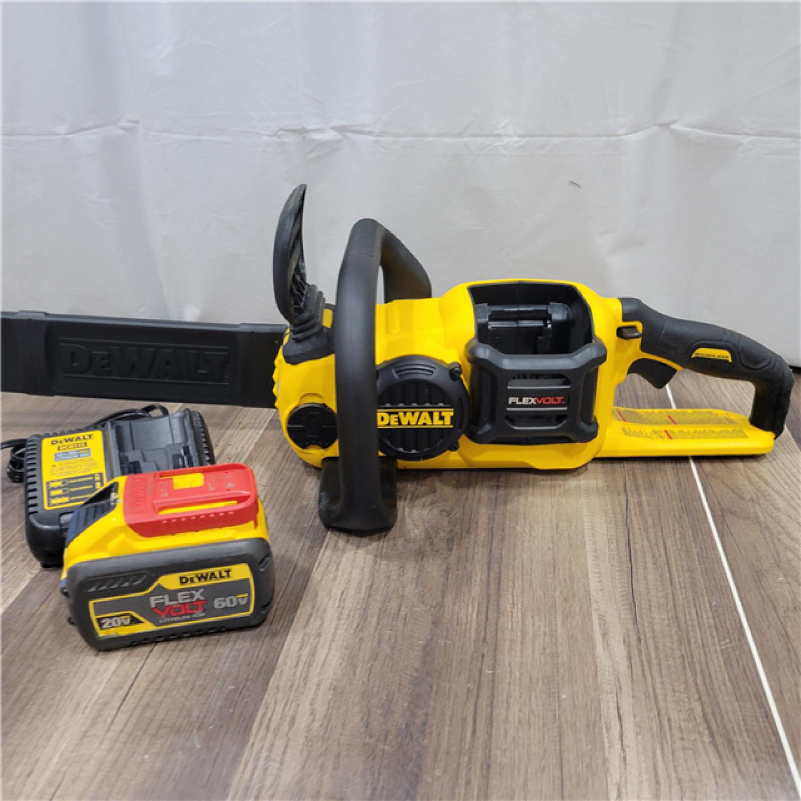 AS-IS   DEWALT  FLEXVOLT 60V MAX 16in. Brushless Cordless Battery Powered Chainsaw Kit with (1) FLEXVOLT 2 Ah Battery & Charger