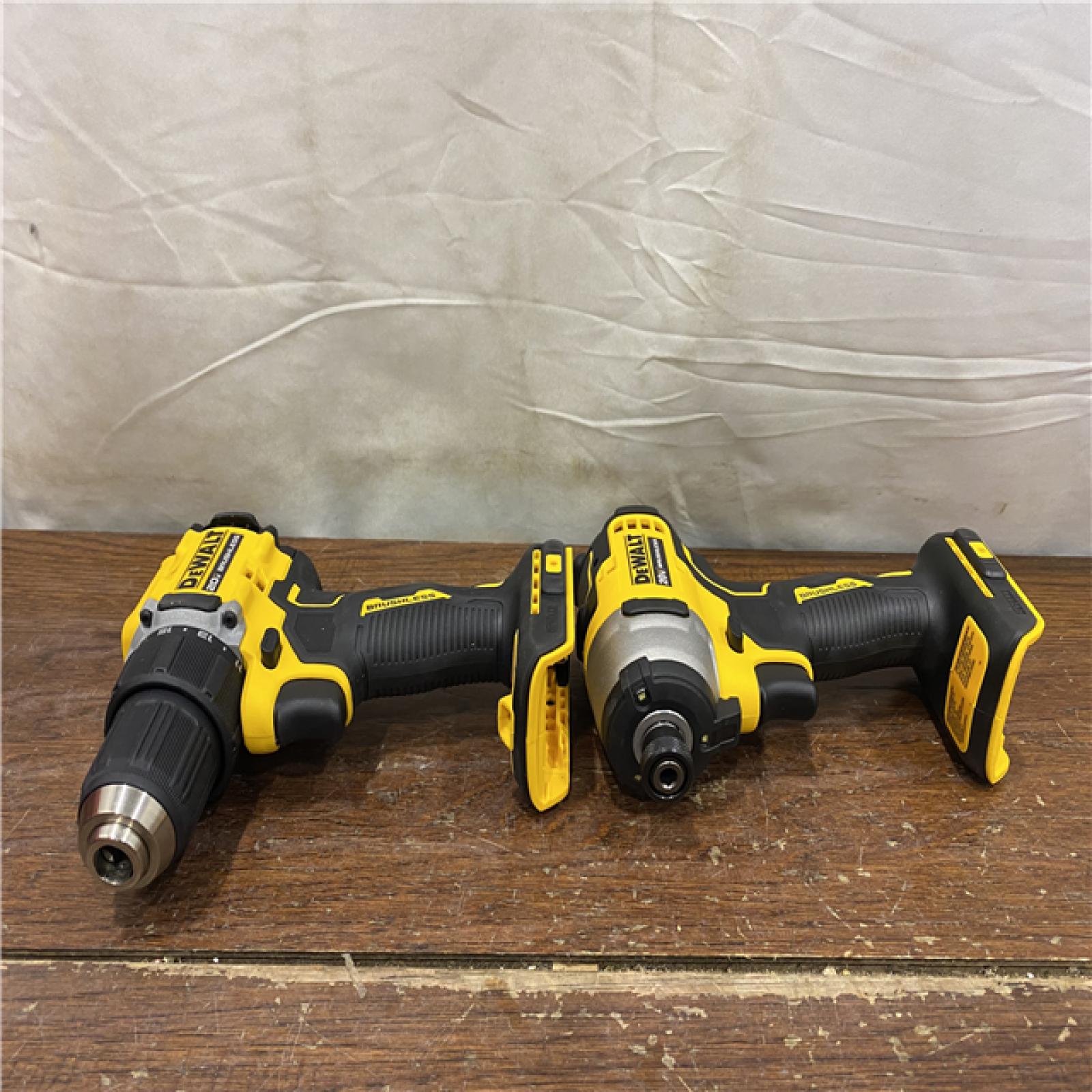AS-IS Dewalt DCK225D2 20V MAX ATOMIC Brushless Compact Lithium-Ion 1/2 in. Cordless Drill Driver and 1/4 in. Impact Driver Combo Kit with 2 Batteries 2 Ah