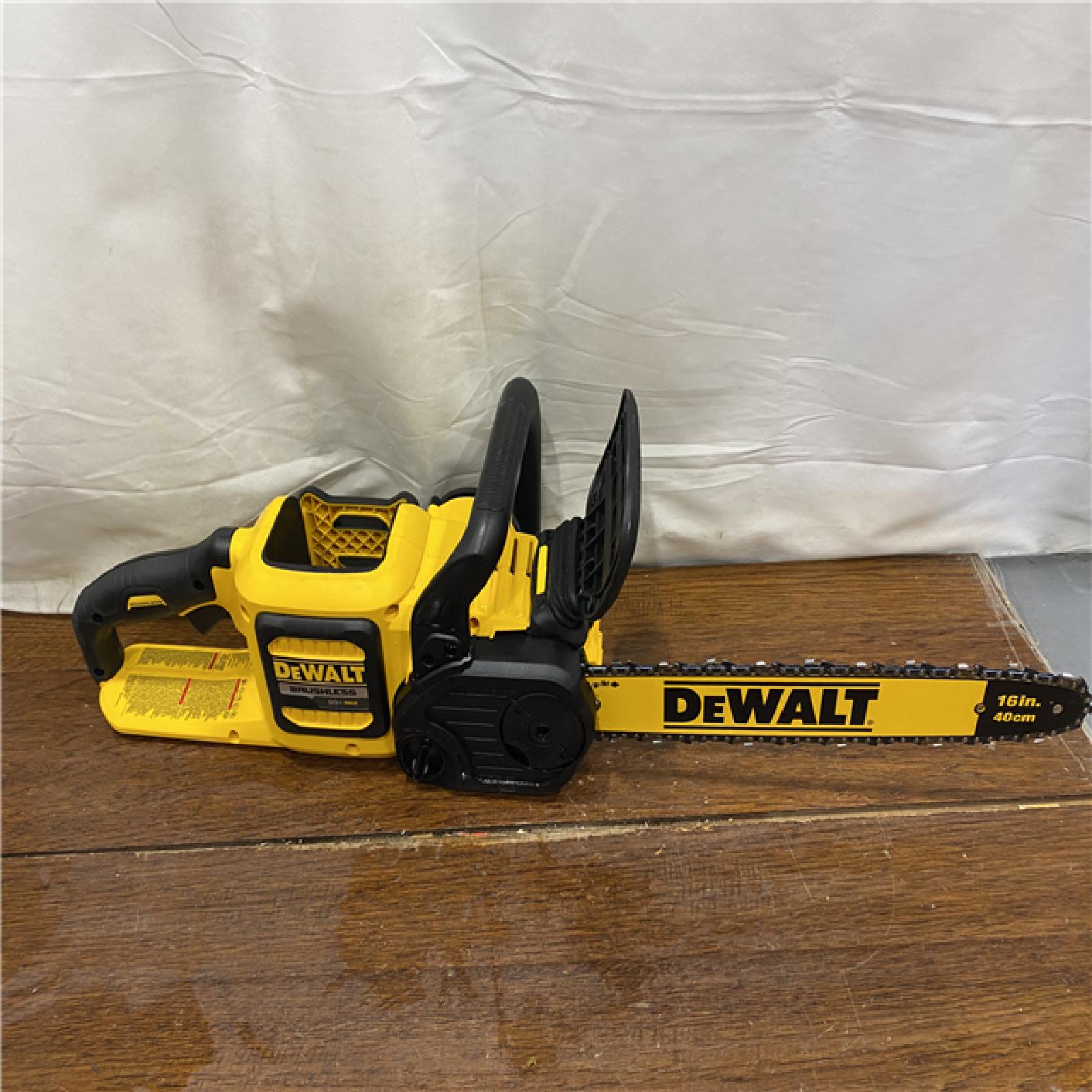 AS-IS DEWALT  FLEXVOLT 60V MAX 16in. Brushless Cordless Battery Powered Chainsaw Kit with (1) FLEXVOLT 2 Ah Battery & Charger