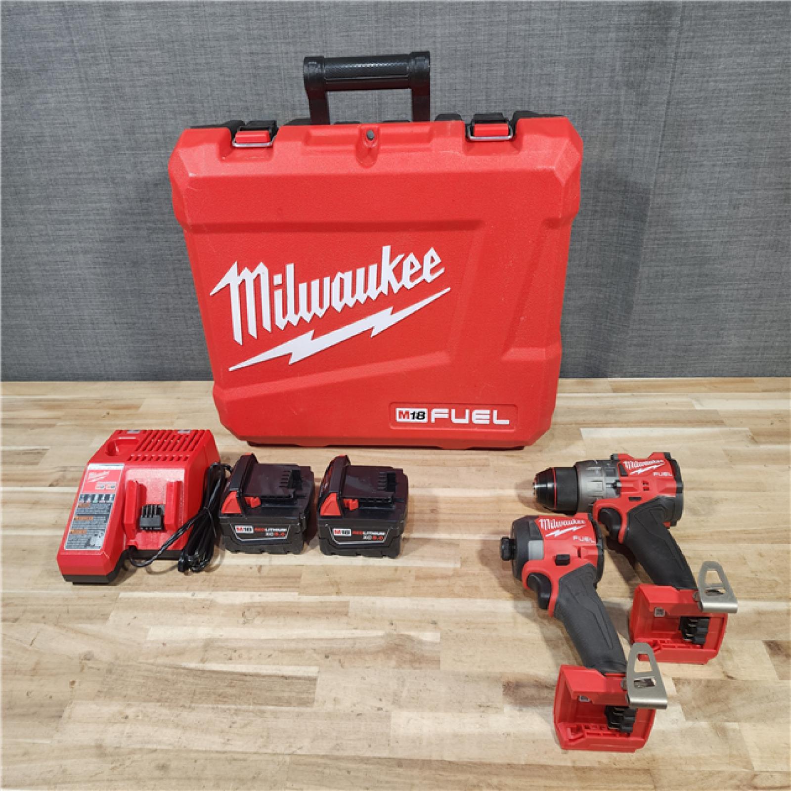 HOUSTON LOCATION - AS-IS Milwaukee  FUEL 18V Lithium-Ion Brushless Cordless Hammer Drill and Impact Driver Combo Kit