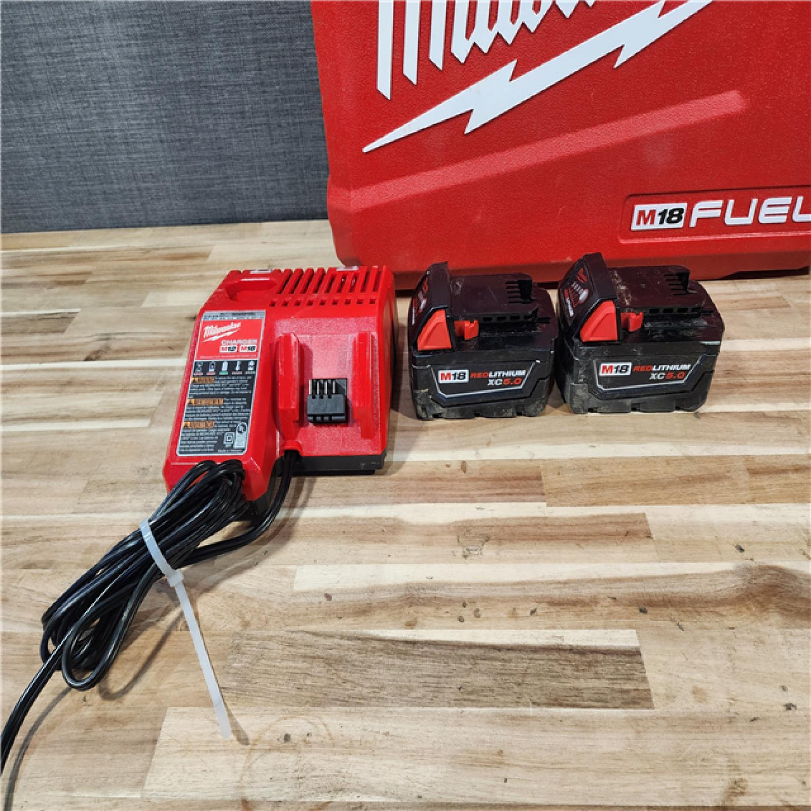 HOUSTON LOCATION - AS-IS Milwaukee  FUEL 18V Lithium-Ion Brushless Cordless Hammer Drill and Impact Driver Combo Kit
