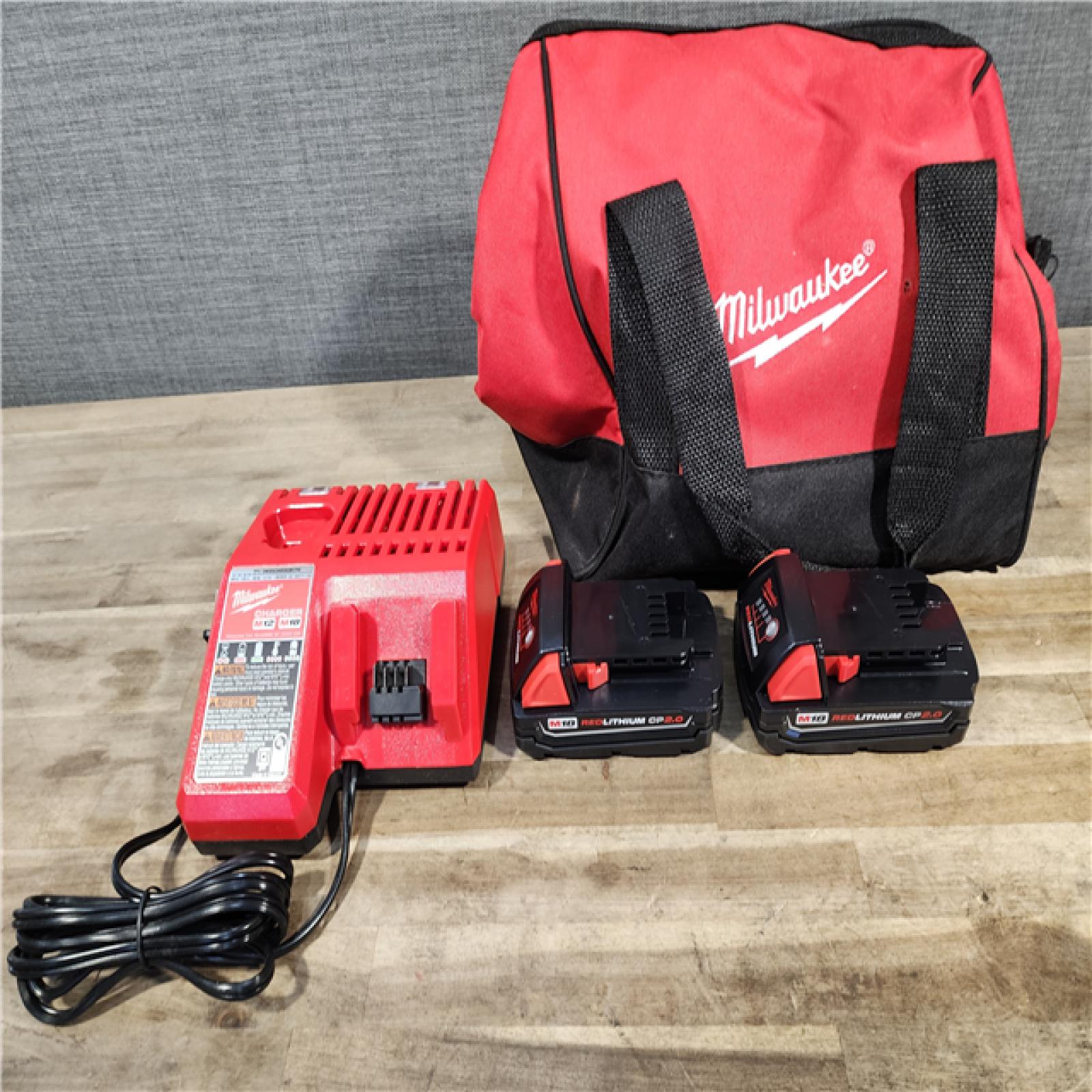 HOUSTON LOCATION - AS-IS Milwaukee M18 18V Lithium-Ion Brushless Cordless Compact Drill/Impact Combo Kit (2-Tool) W/(2) 2.0 Ah Batteries, Charger & Bag