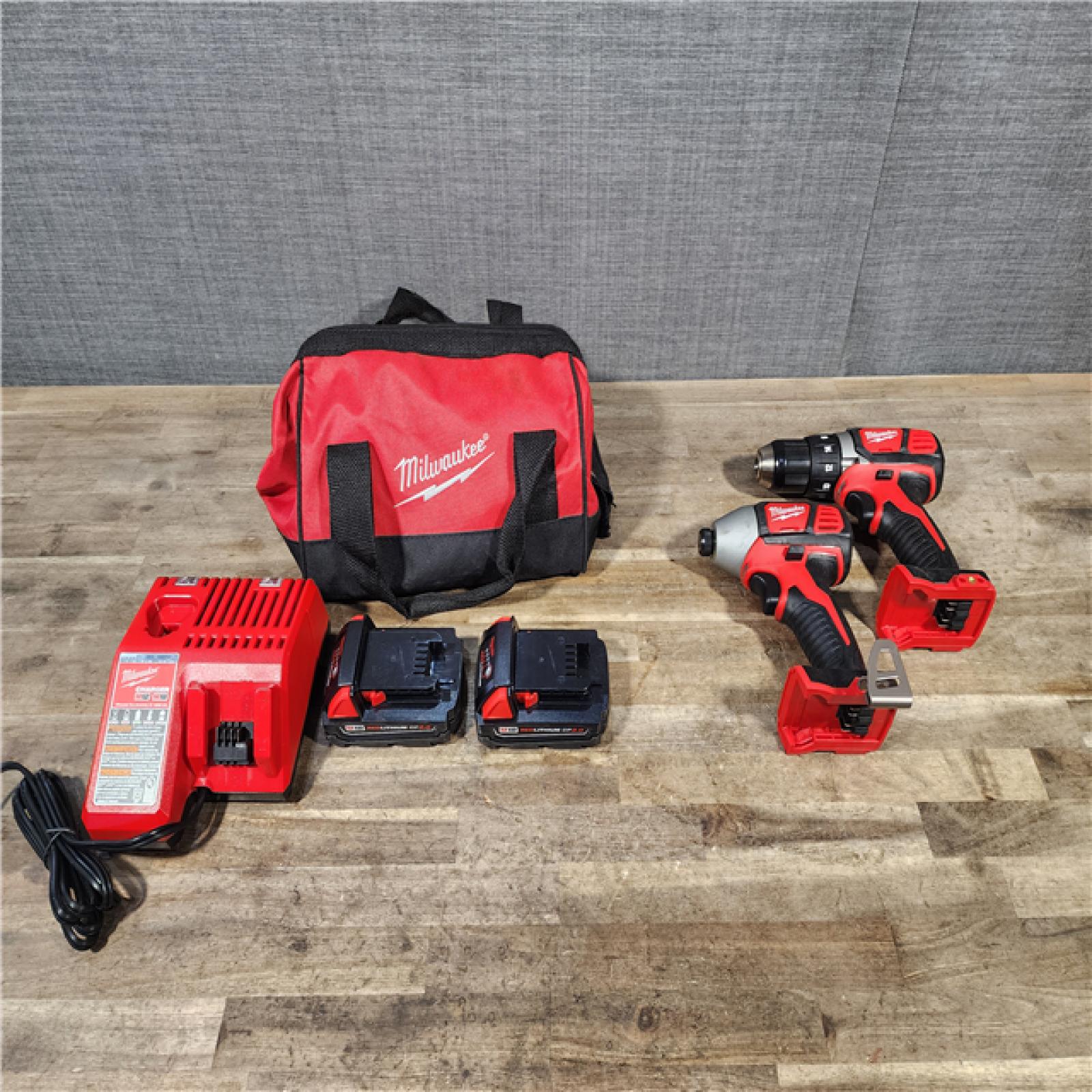 HOUSTON LOCATION - AS-IS Milwaukee M18 Brushed Cordless (2-Tool) Drill/Driver and Impact Driver Kit