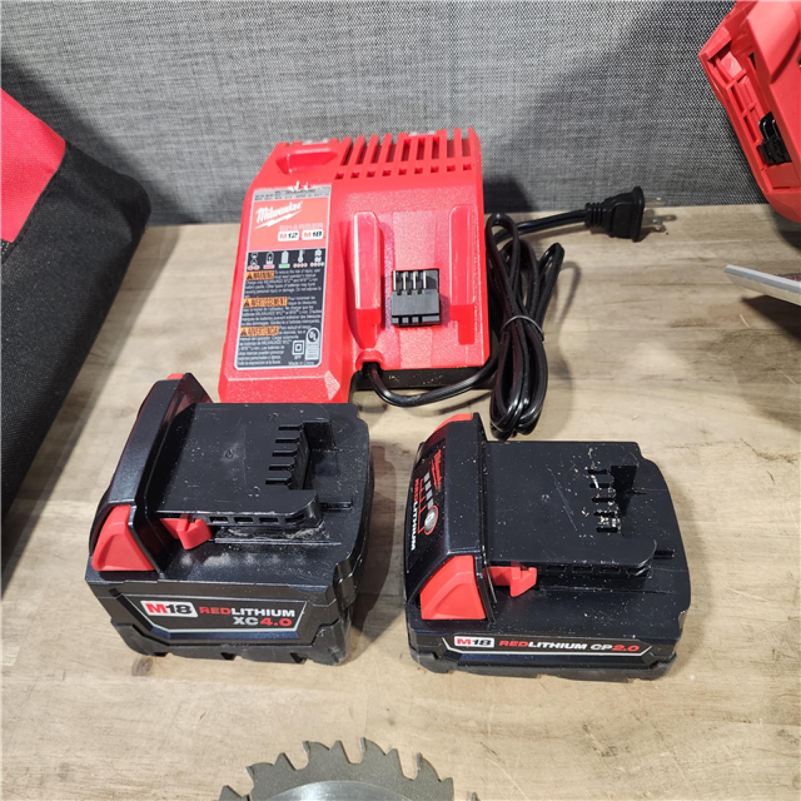 HOUSTON LOCATION - AS-IS MILWAUKEE 4 TOOL COMBO KIT W/ (2) BATTERY & CHARGER