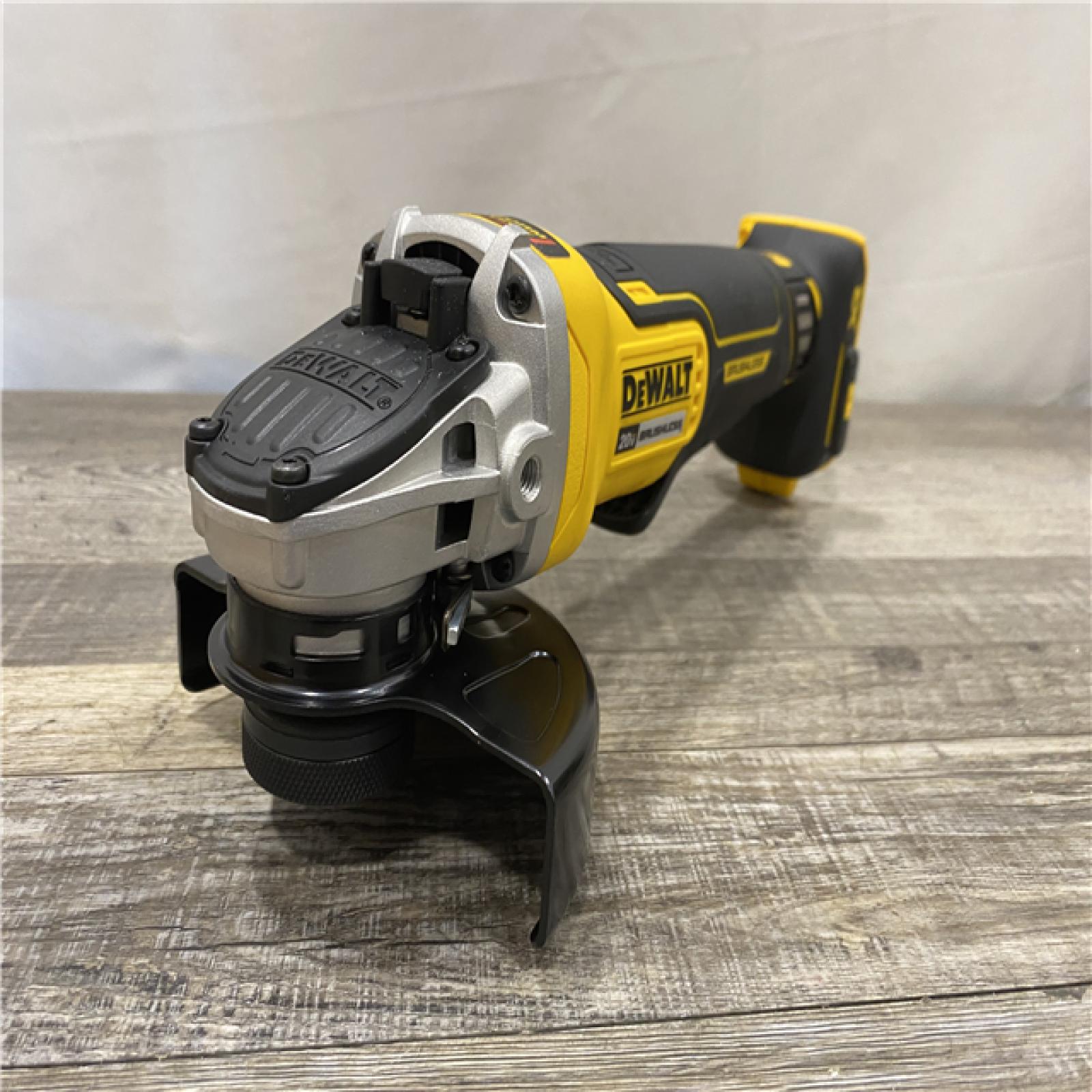 AS-IS DEWALT 20V MAX XR Cordless Brushless 4.5 in. Paddle Switch Small Angle Grinder with Kickback Brake (Tool Only)