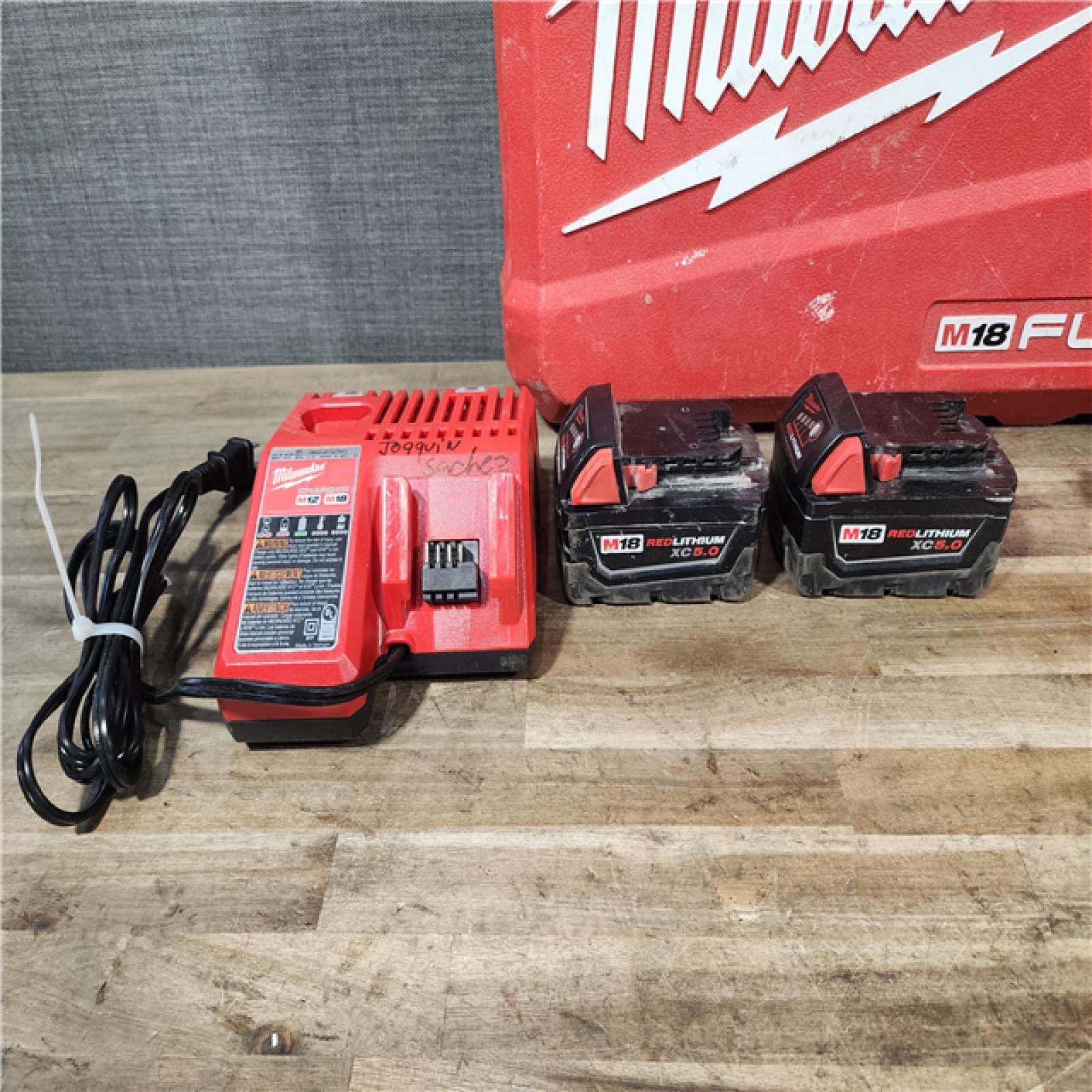 HOUSTON LOCATION - AS-IS Milwaukee FUEL 18V Lithium-Ion Brushless Cordless Hammer Drill and Impact Driver Combo Kit