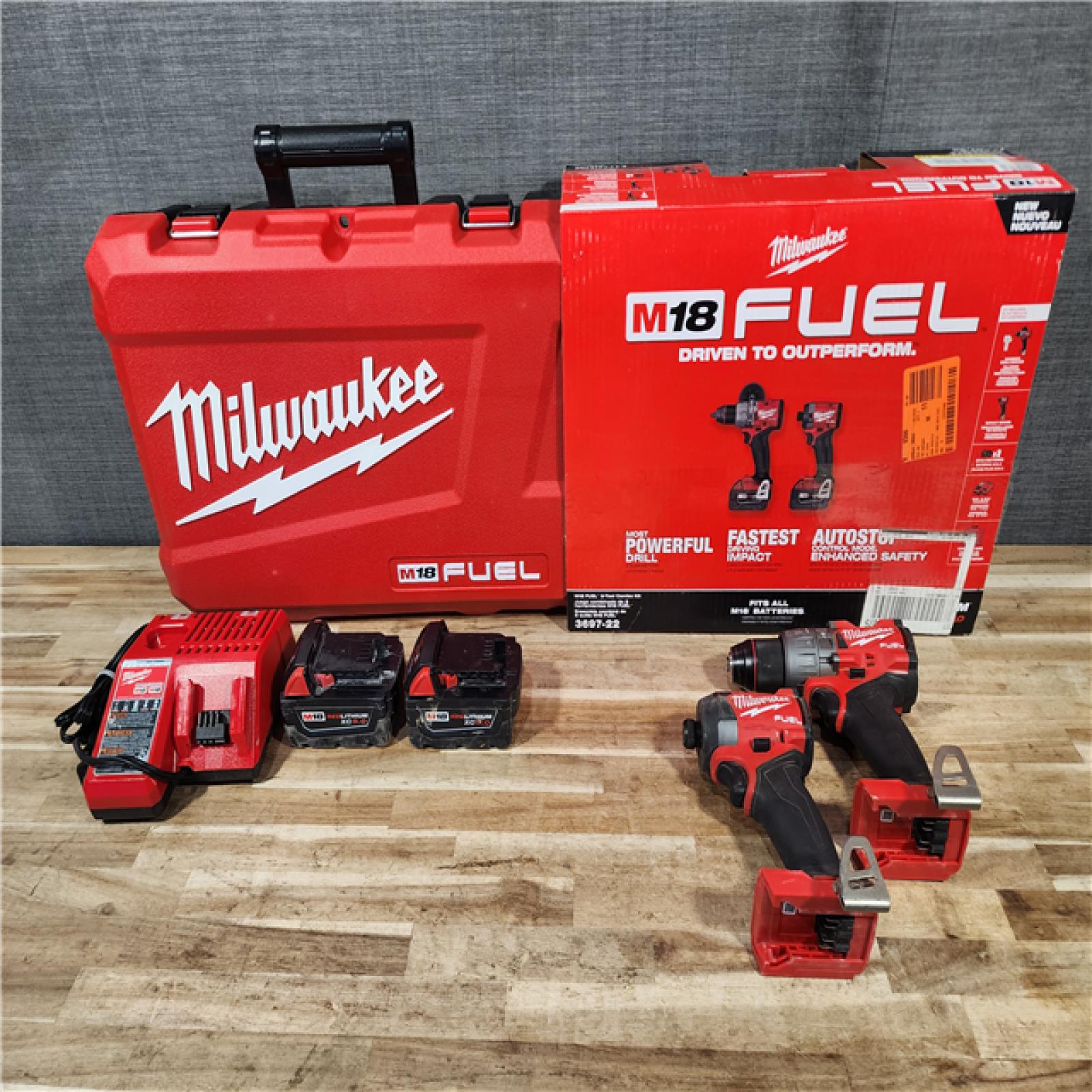 HOUSTON LOCATION - AS-IS Milwaukee FUEL 18V Lithium-Ion Brushless Cordless Hammer Drill and Impact Driver Combo Kit
