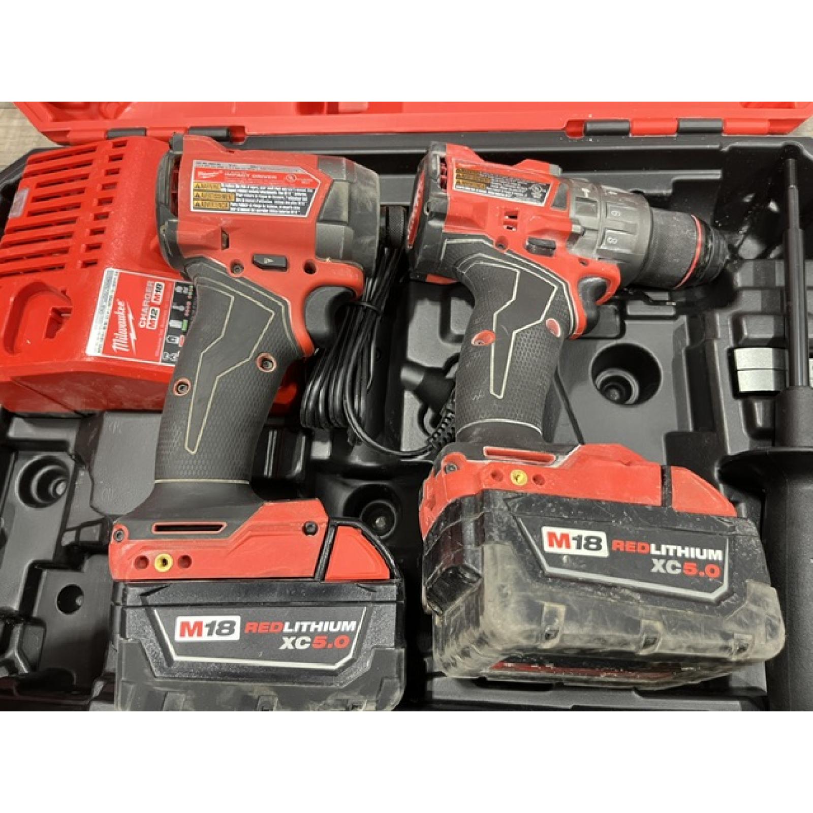 AS-IS Milwaukee FUEL 18V Lithium-Ion Brushless Cordless Hammer Drill and Impact Driver Combo Kit