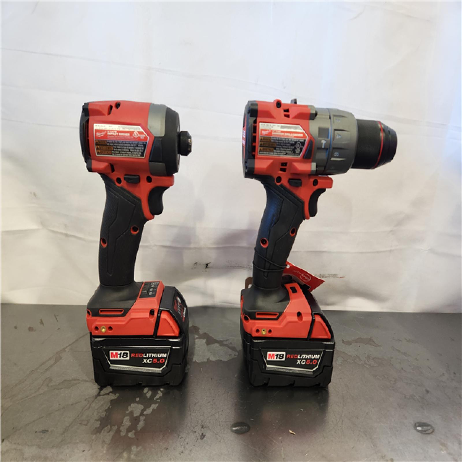 AS-IS- Milwaukee FUEL 18V Lithium-Ion Brushless Cordless Hammer Drill and Impact Driver Combo Kit