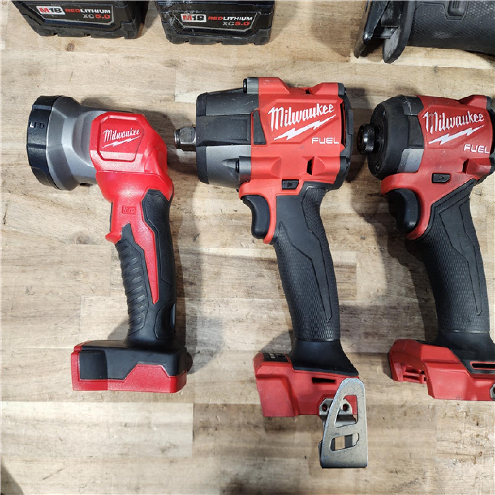 HOUSTON LOCATION - AS-IS MILWAUKEE 6 TOOL COMBO KIT W/ (2) BATTERY & CHARGER
