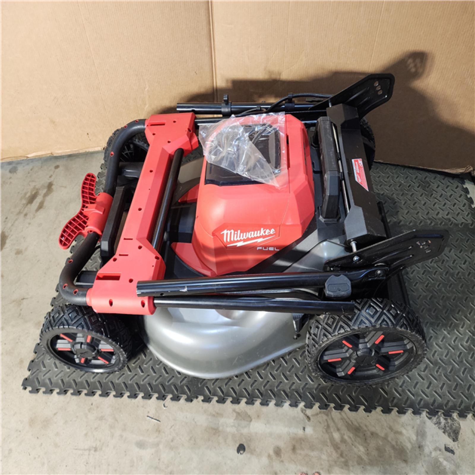 HOUSTON LOCATION - AS-IS M18 FUEL Brushless Cordless 21 in. Walk Behind Dual Battery Self-Propelled Mower W/(2) 12.0Ah Battery and Rapid Charger
