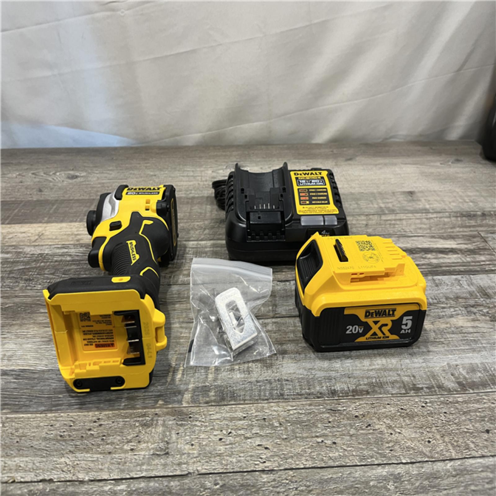 AS-IS DEWALT ATOMIC 20V MAX Lithium-Ion Cordless 1/4 in. Brushless Impact Driver Kit
