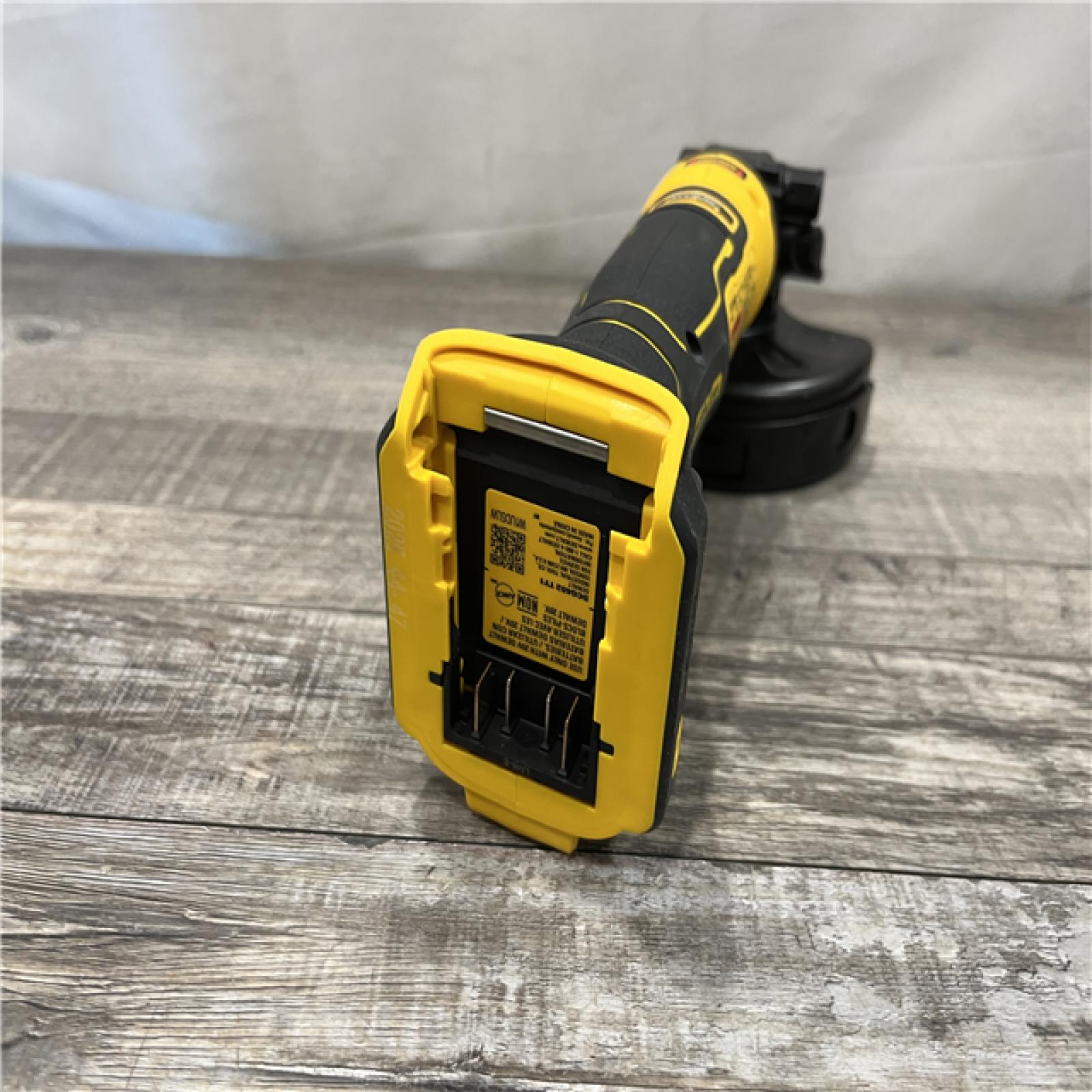 AS-IS DEWALT ATOMIC 20V MAX Cordless 4-1/2 in. Angle Grinder with Paddle Switch (Tool Only)