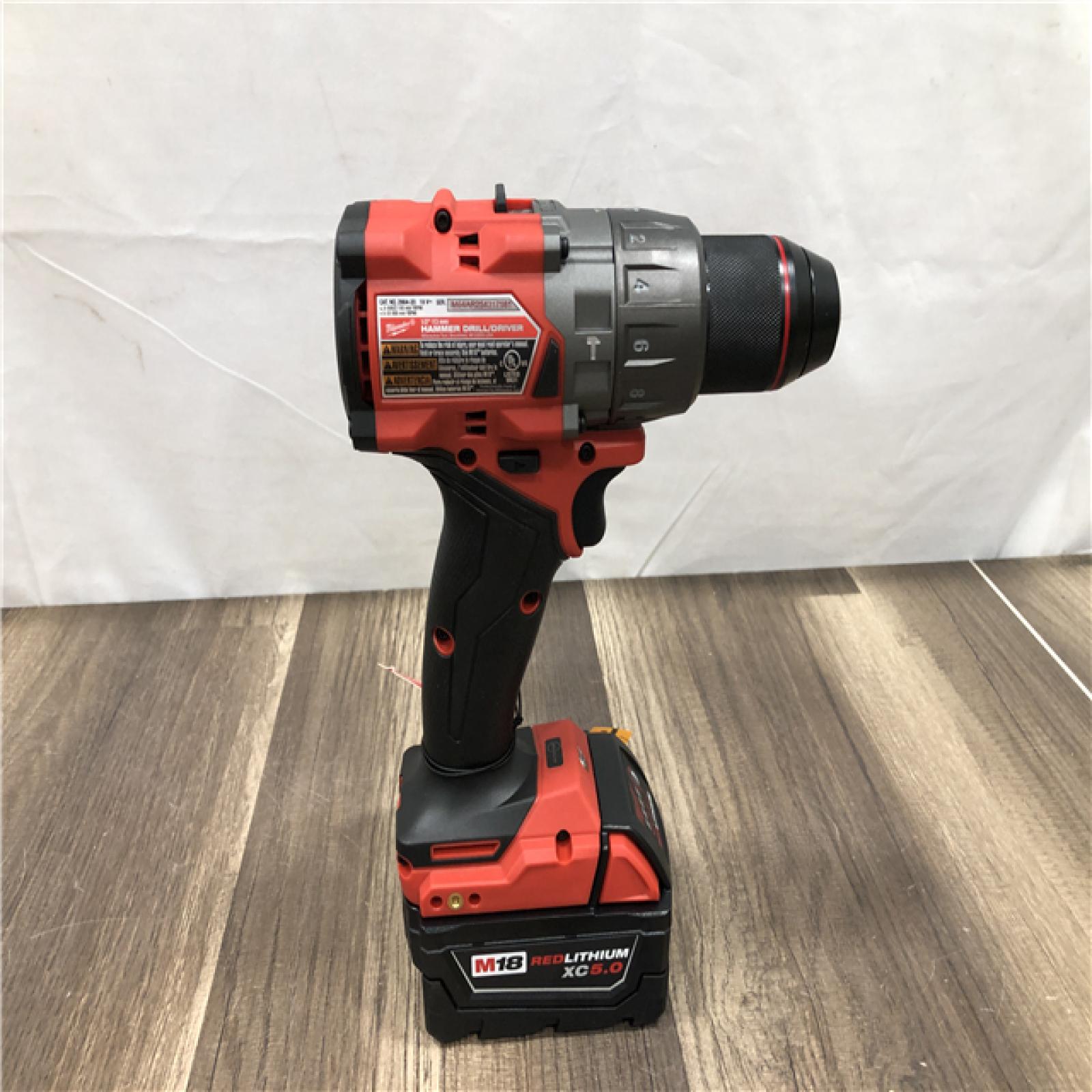 AS-IS Milwaukee FUEL 18V Lithium-Ion Brushless Cordless 1/2 in. Hammer Drill Driver Kit