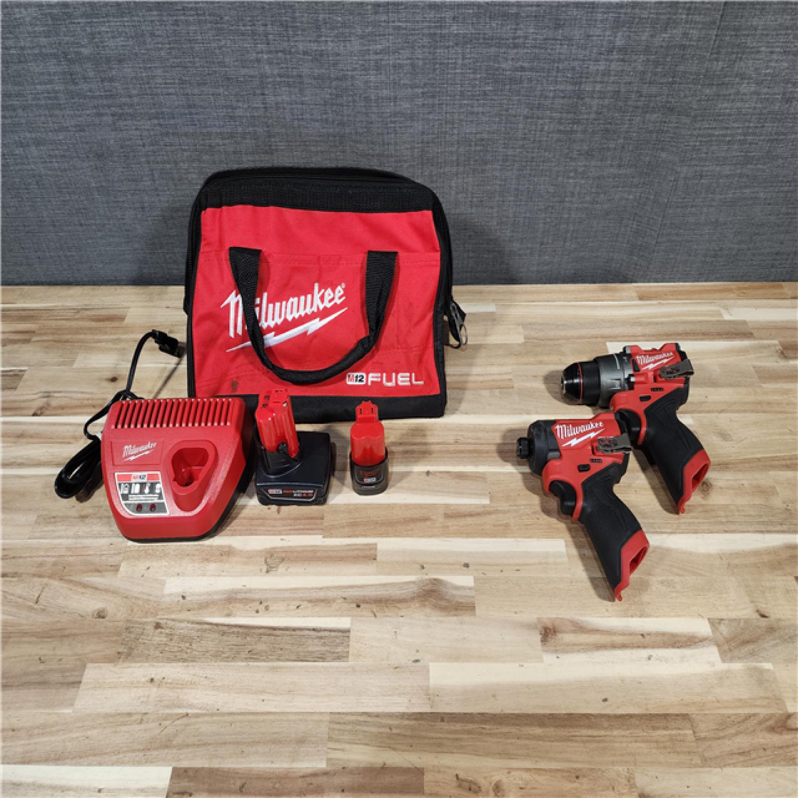 HOUSTON LOCATION - AS-IS Milwaukee FUEL 12-Volt Lithium-Ion Brushless Cordless Hammer Drill and Impact Driver Combo Kit